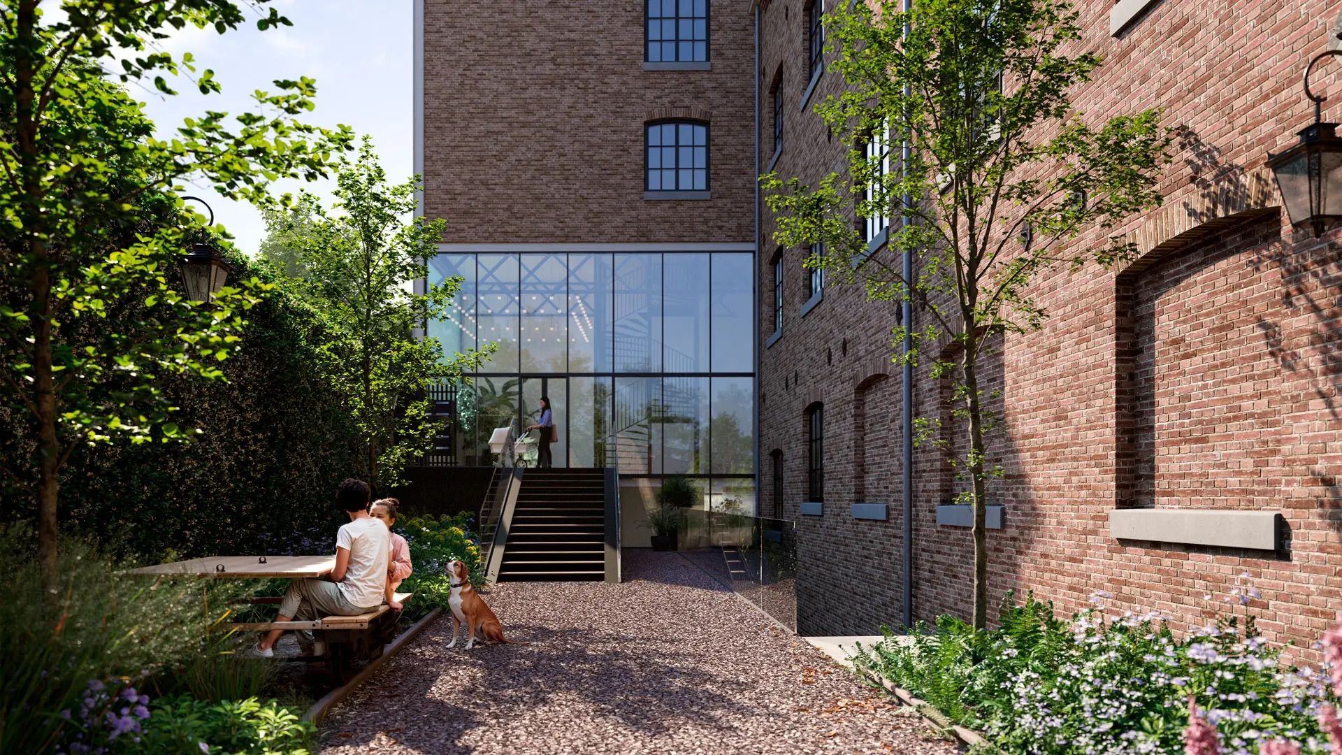Binnenterrein van een getransformeerd fabriekscomplex met 90 appartementen en penthouses en 10.000 m² tegelwerk in Maastricht.